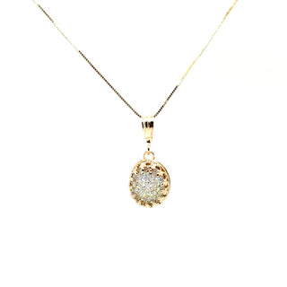 A white druzy queen pendant necklace on a 14k solid gold chain, displaying a sparkling, intricate pattern.